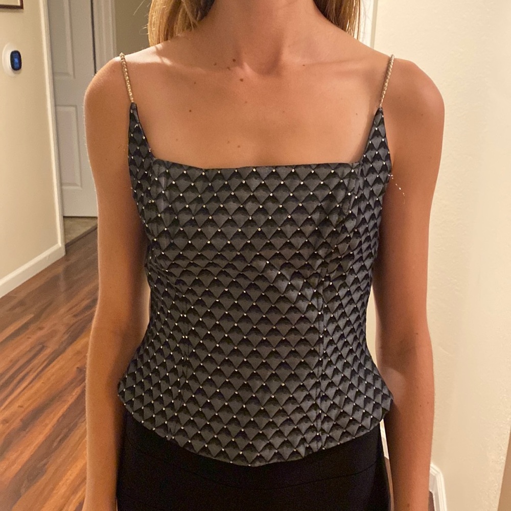 Black, grey, and silver corset top. size 4. Gently used. Brand: Niki.